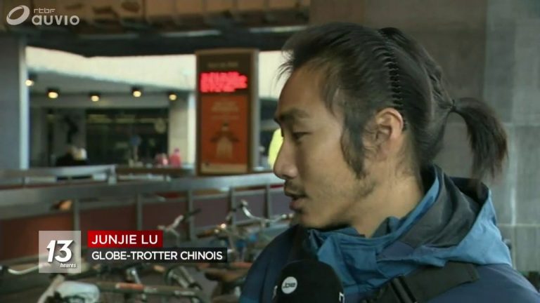 比利时媒体关注报道：中国车手骑行环游世界差一站到终点 却在布鲁塞尔丢了自行车